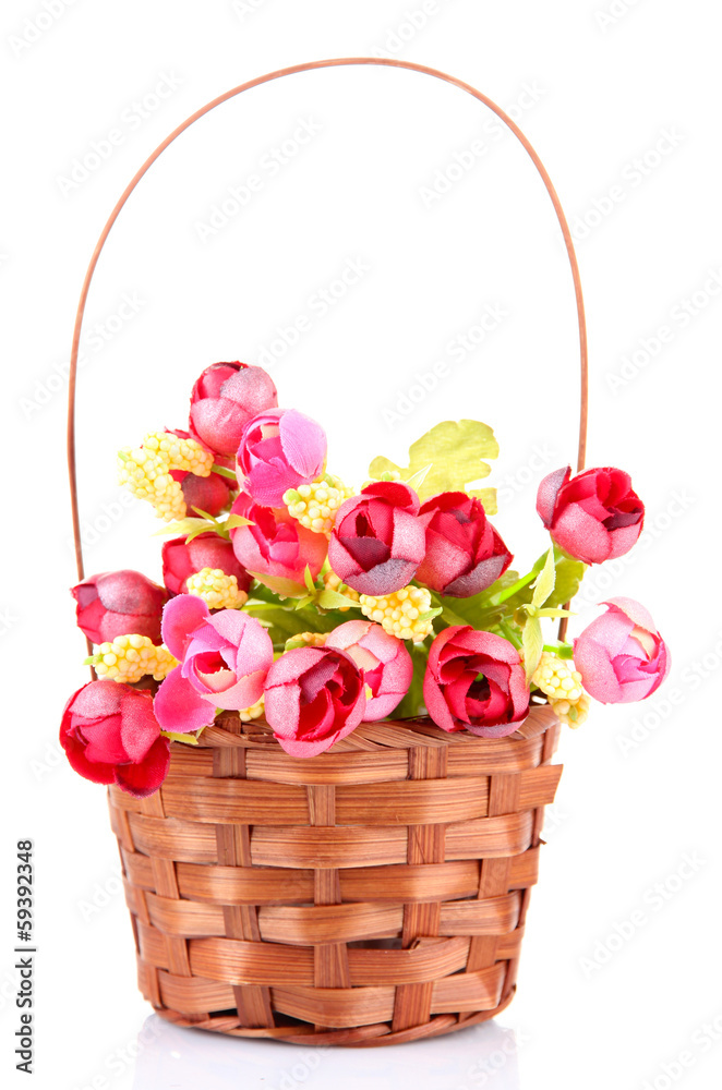 Obraz premium Bouquet of beautiful artificial flowers in wicker basket,