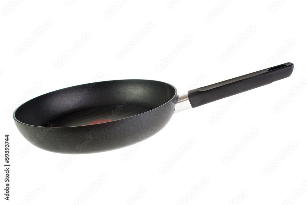 Black teflon coated frying pan , isolated on white Black teflon coated frying pan , isolated on white