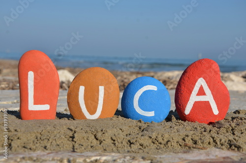 Luca, male name on colourful stones