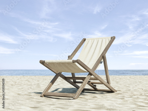 Chaise longue on beach