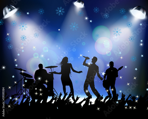 People dancing in rock concert Christmas party