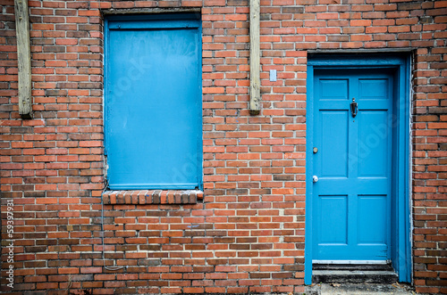 Blue door and windows, brick building, Treme, New Orleans