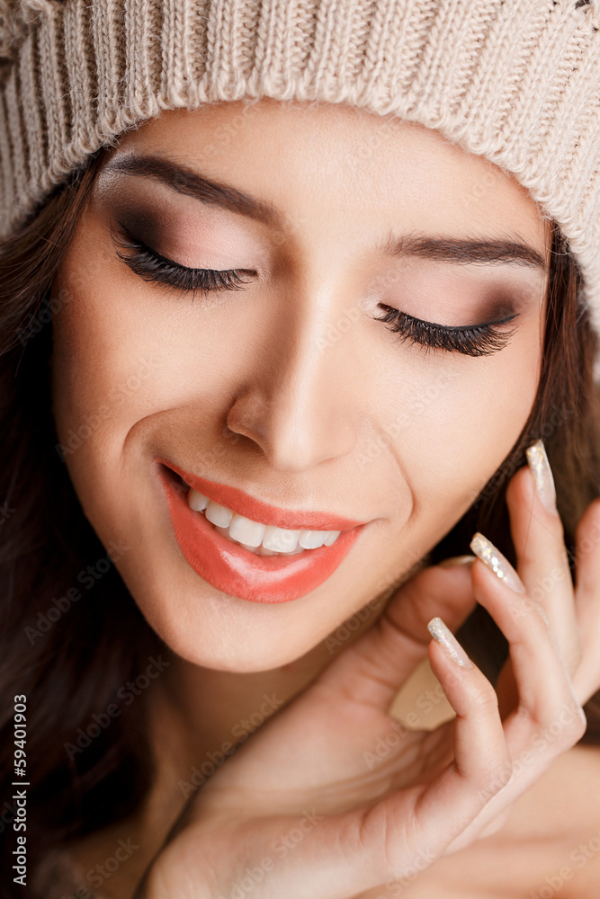 Surprised happy young girl in winter cap Surprised happy young girl in winter cap