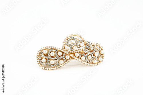 Pearl brooch isolated on a white background