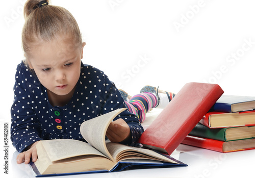 Girls read book isolated on white