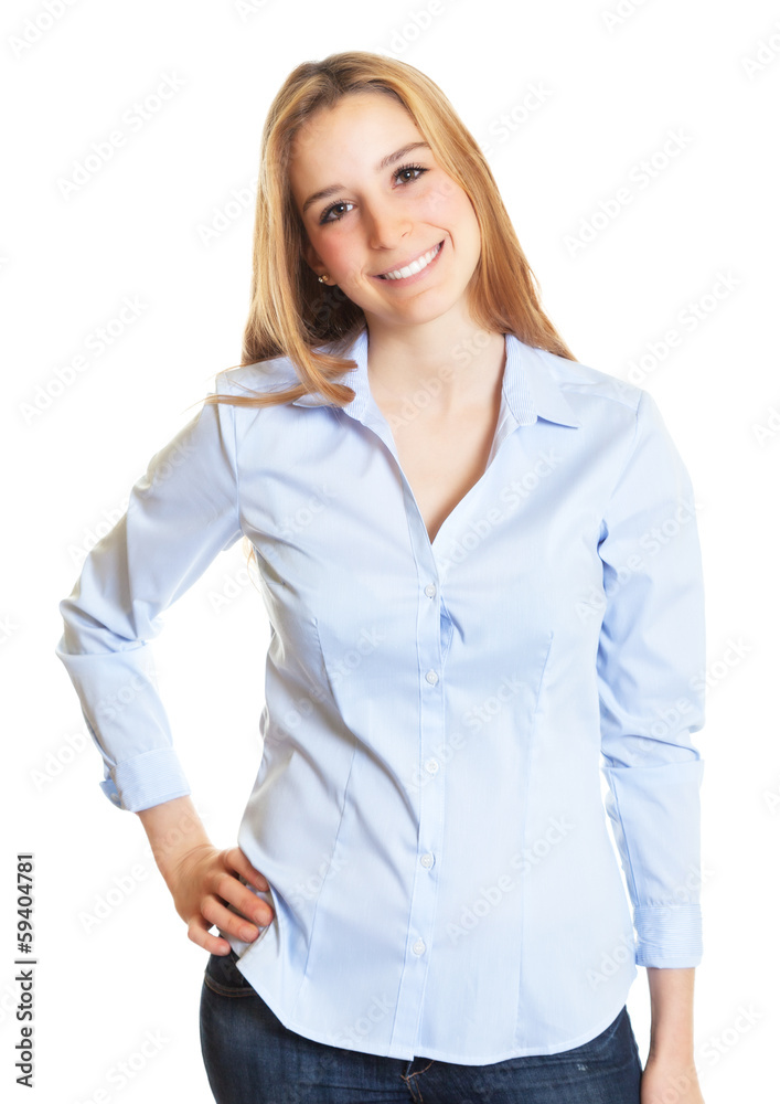 Stehende Frau mit langen blonden Haaren schaut zur Kamera Stehende Frau mit langen blonden Haaren schaut zur Kamera