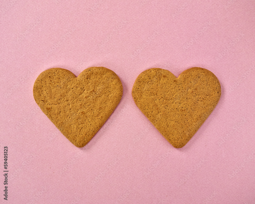 heart shaped cookies on pink background heart shaped cookies on pink background