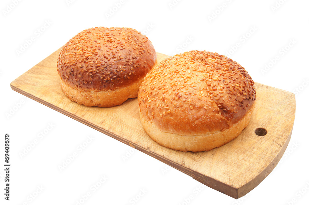 bun with sesame seeds on a white background