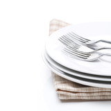 tableware- plates and forks, isolated, selective focus