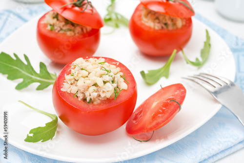 tomatoes stuffed with tuna salad, bulgur and greens