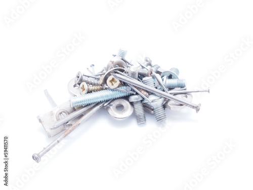 Nails  screws and nuts on a white background