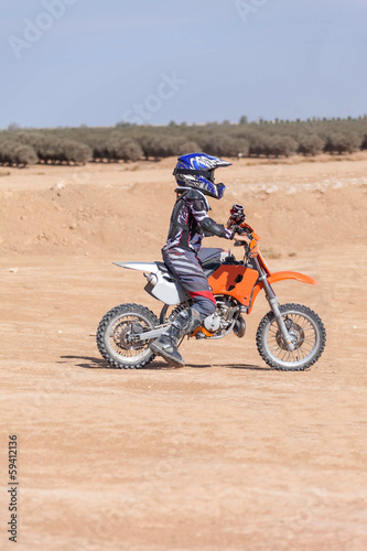 racing motorcycles for teenagers on desert