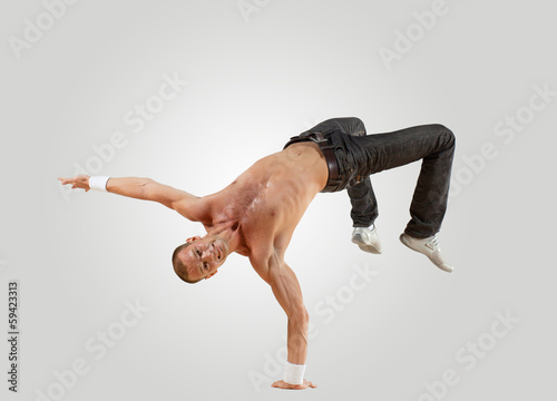 Modern style dancer posing photo