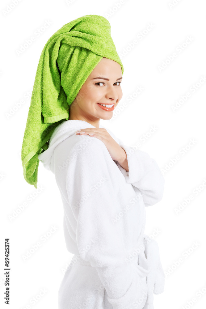 Obraz premium Beautiful spa woman in bathrobe and turban.