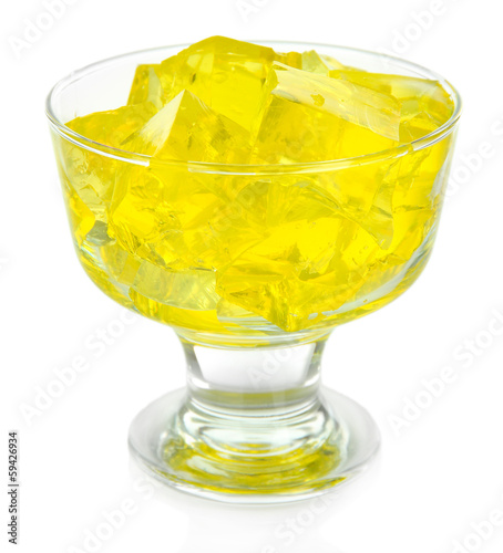 Tasty jelly cubes in bowl isolated on white