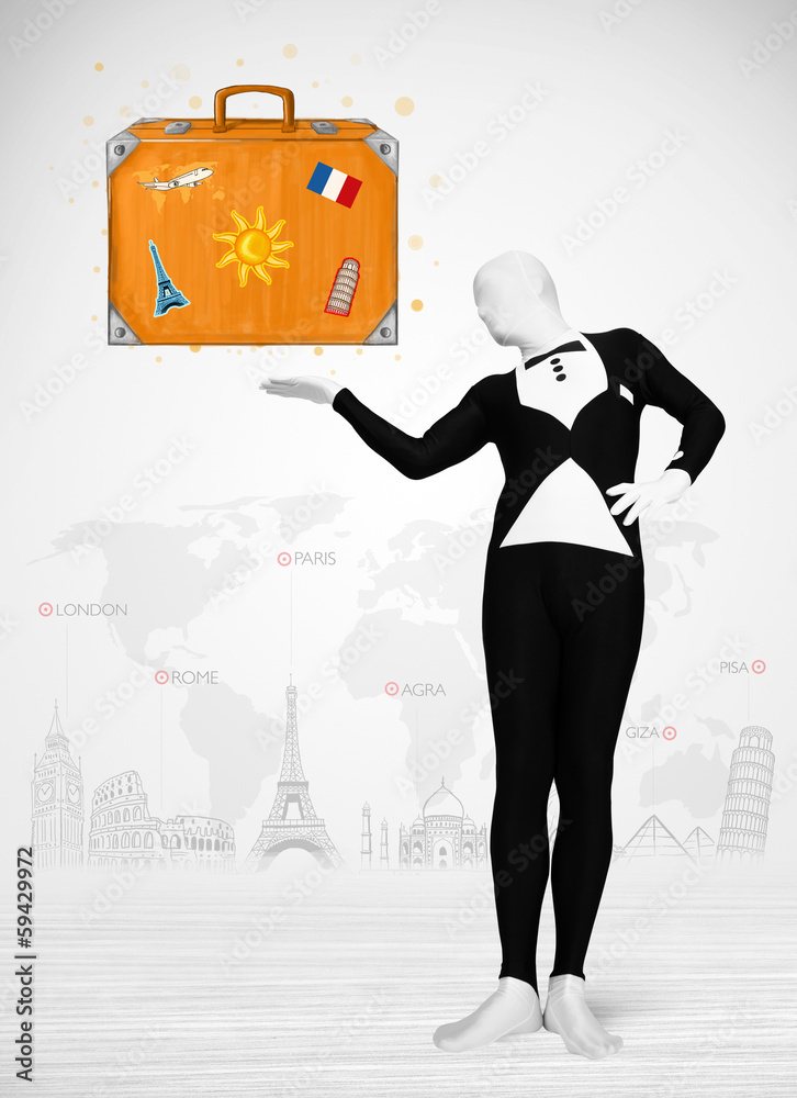 man in full body suit presenting vacation suitcase man in full body suit presenting vacation suitcase