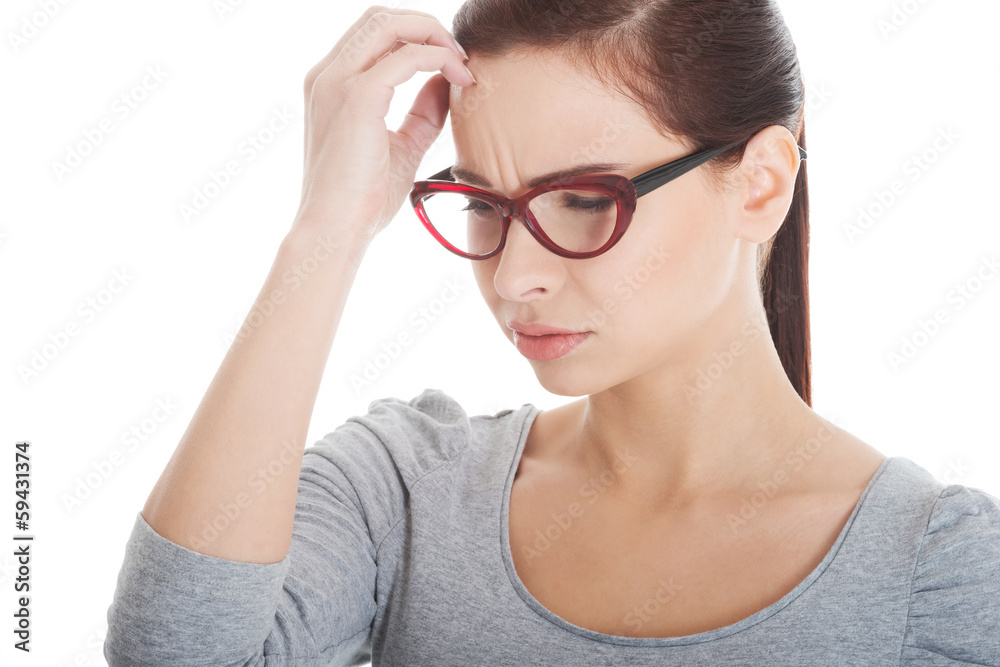 Beautiful woman in eyeglasses worrying. Beautiful woman in eyeglasses worrying.