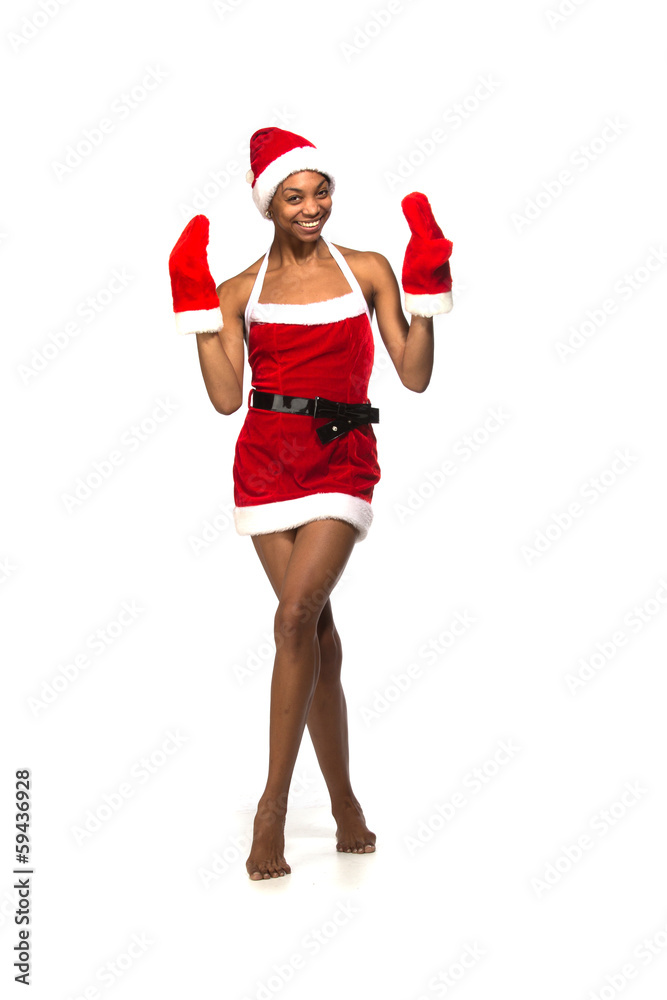 Christmas afro american woman wearing a santa hat smiling Christmas afro american woman wearing a santa hat smiling