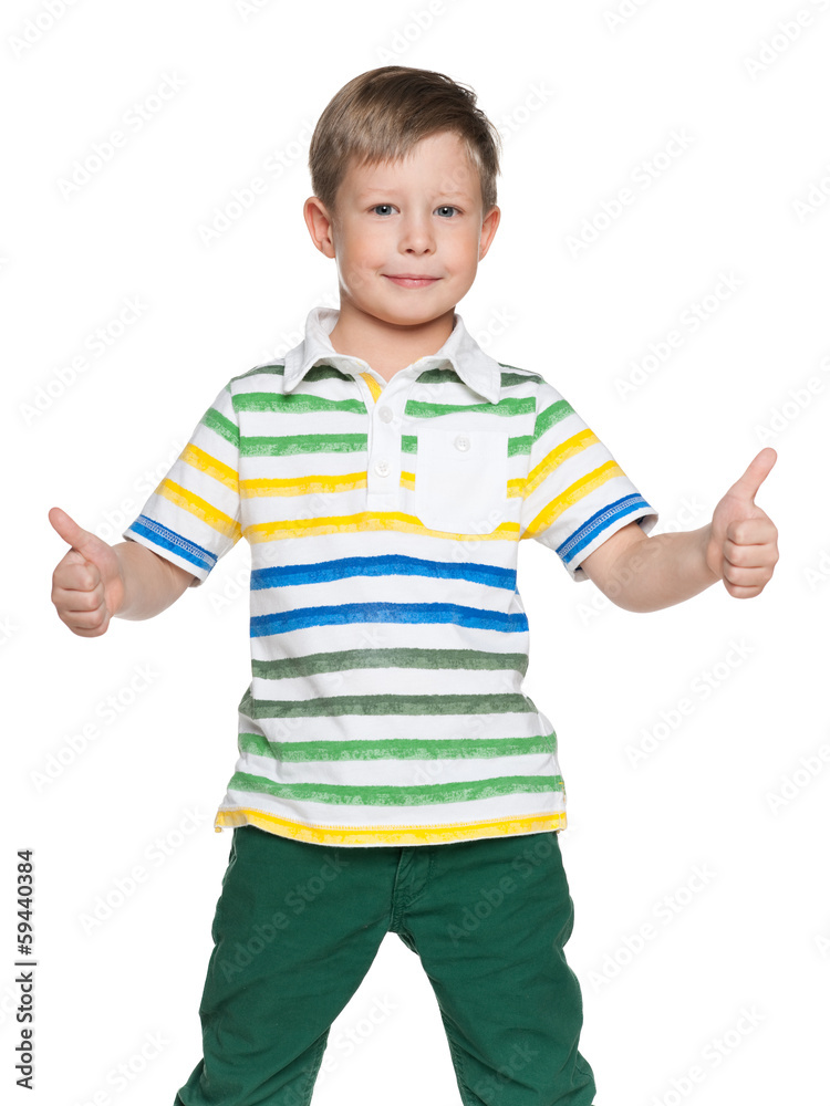 Smiling boy holds his thumbs up Smiling boy holds his thumbs up