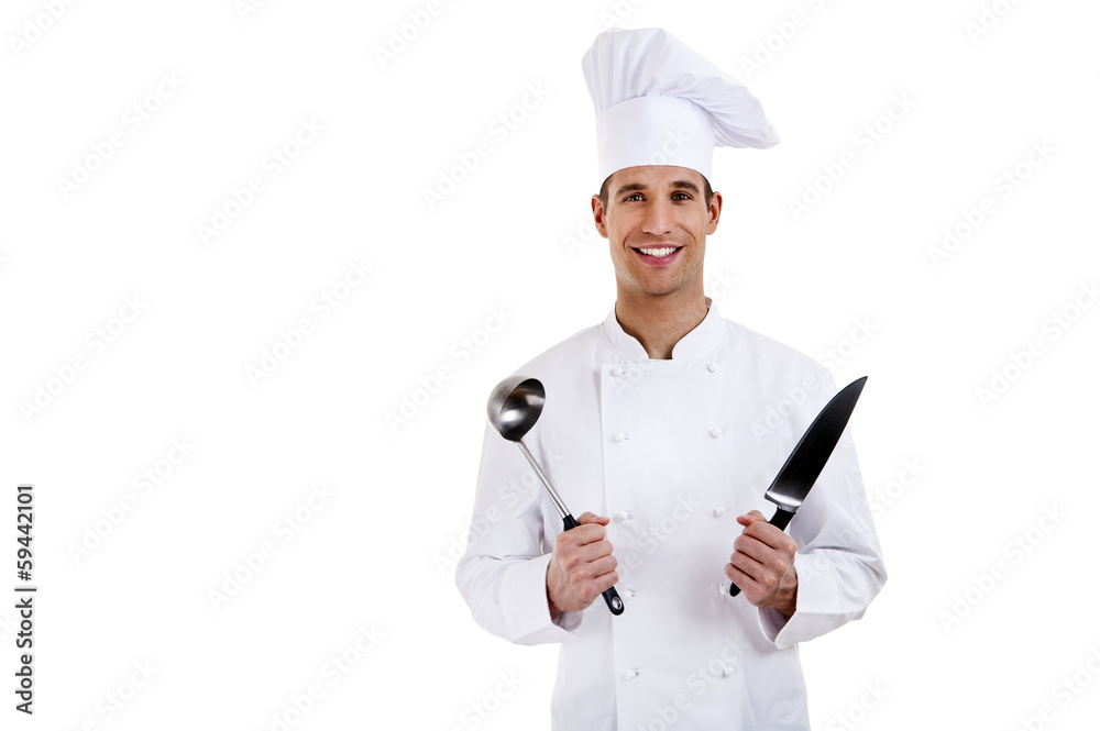 Chef. Isolated over white background. Holding knife and spoon Chef. Isolated over white background. Holding knife and spoon