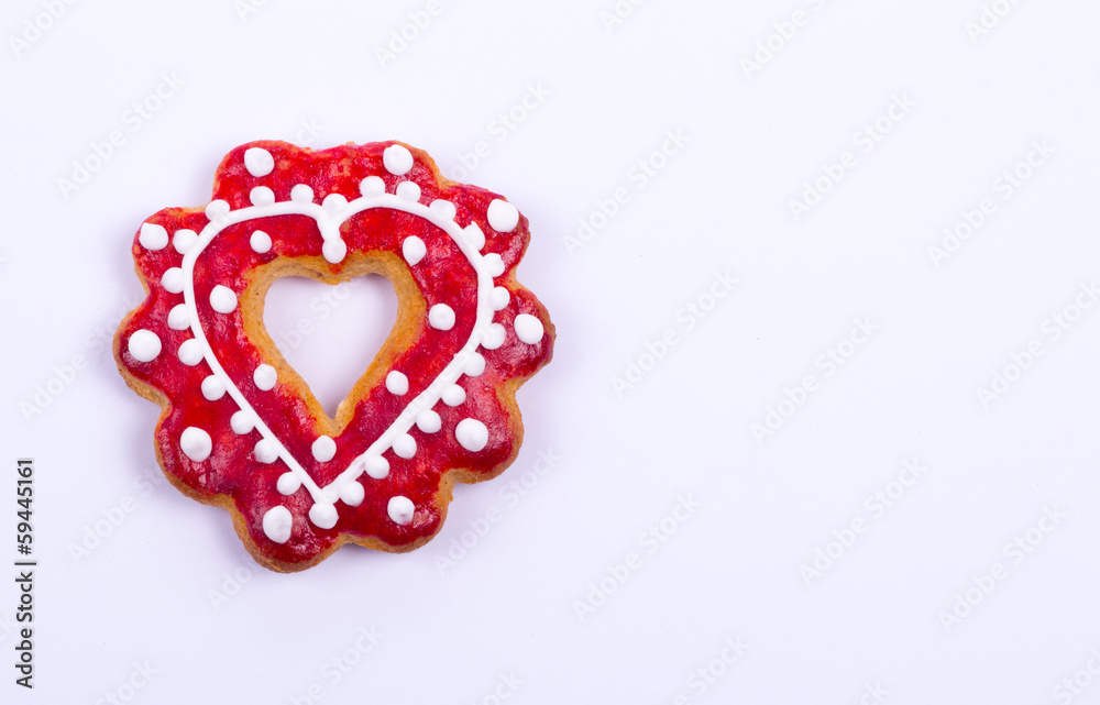 Gingerbread cookies and spices over white background close up Gingerbread cookies and spices over white background close up