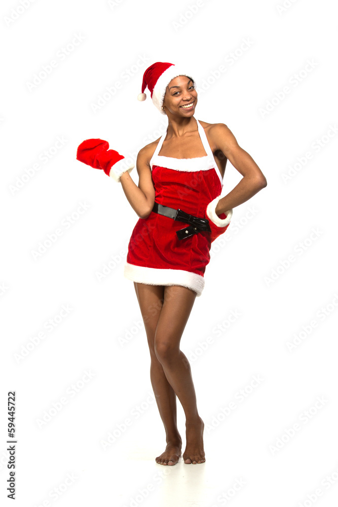 Christmas afro american woman wearing a santa hat smiling Christmas afro american woman wearing a santa hat smiling