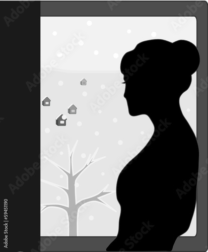 Girl near window in winter