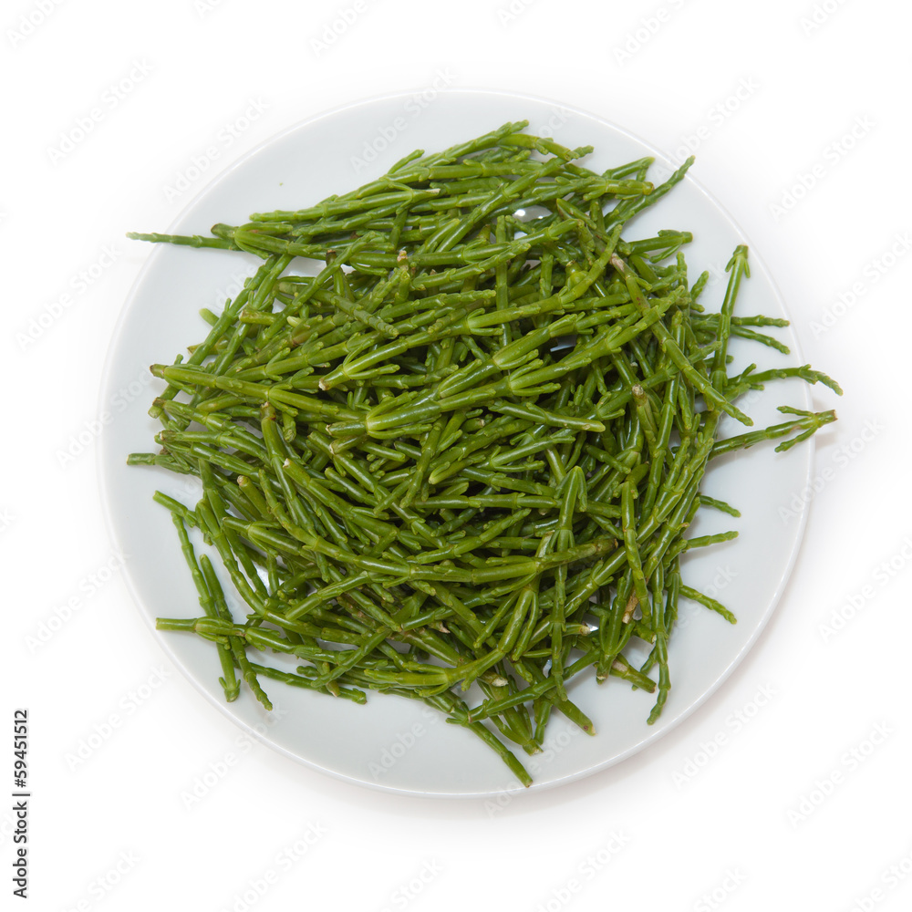 Plate of Samphire isolated on a white studio background. Plate of Samphire isolated on a white studio background.