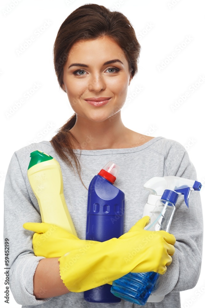 Beautiful woman in gloves with cleaning sprays Beautiful woman in gloves with cleaning sprays