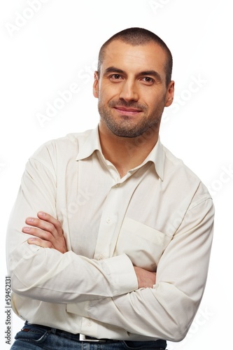 Handsome man in white shirt isolated on white background © Nejron Photo