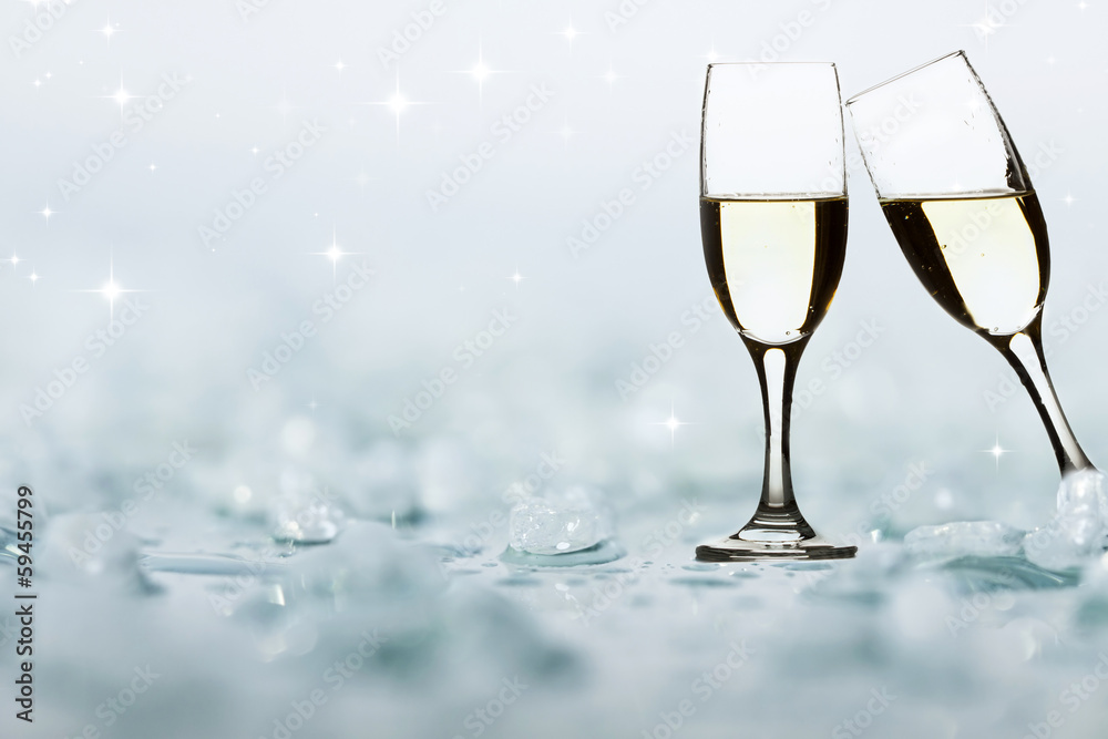 Glasses with champagne against holiday lights Glasses with champagne against holiday lights