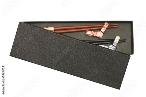 Set of Two Pairs of Chopsticks in Black Case isolated on white