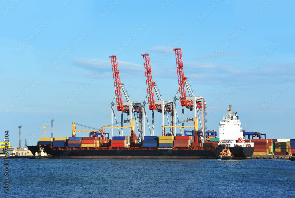 Container stack and ship under crane bridge Container stack and ship under crane bridge