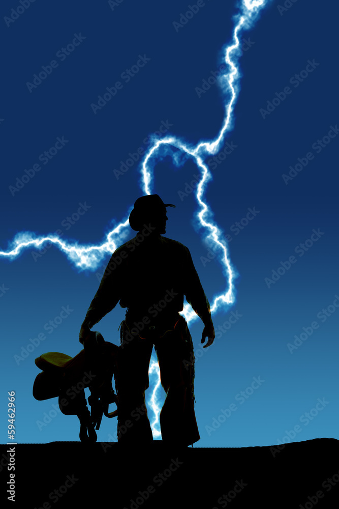 Fototapeta premium Silhouette man holding a saddle by side lighting