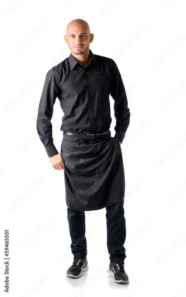 Handsome young restaurant or bar waiter, standing on white Handsome young restaurant or bar waiter, standing on white