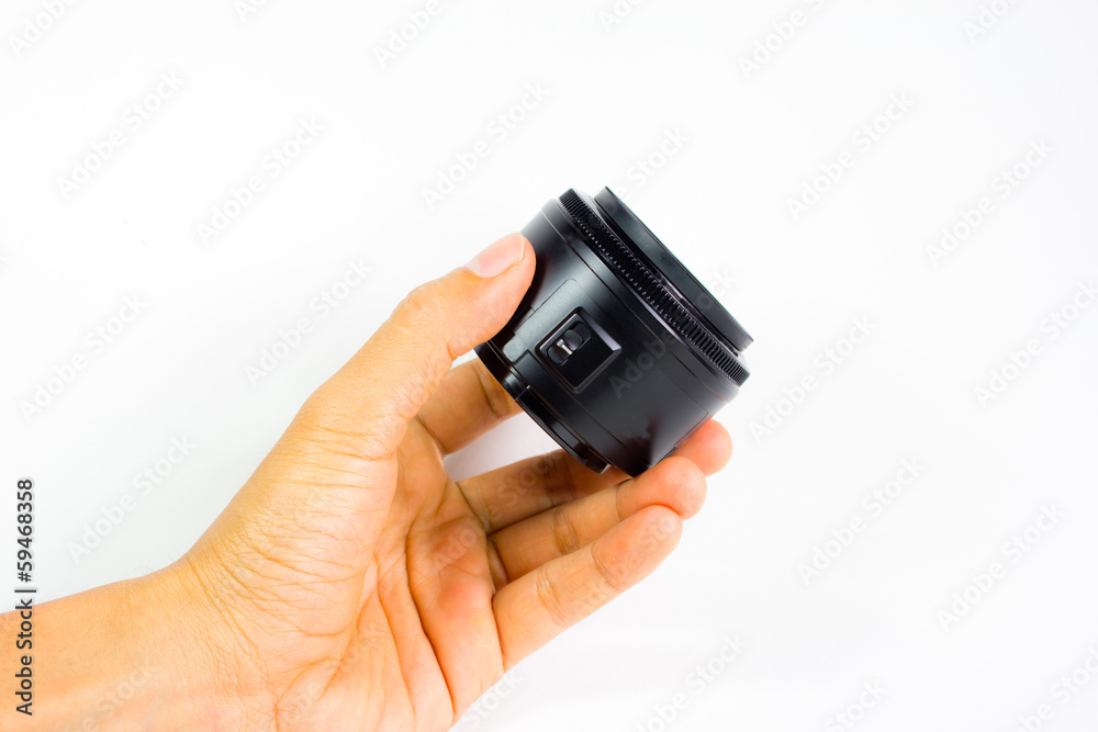 camera lens in hand white background camera lens in hand white background