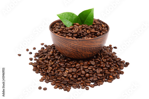 Cup with coffee beans.