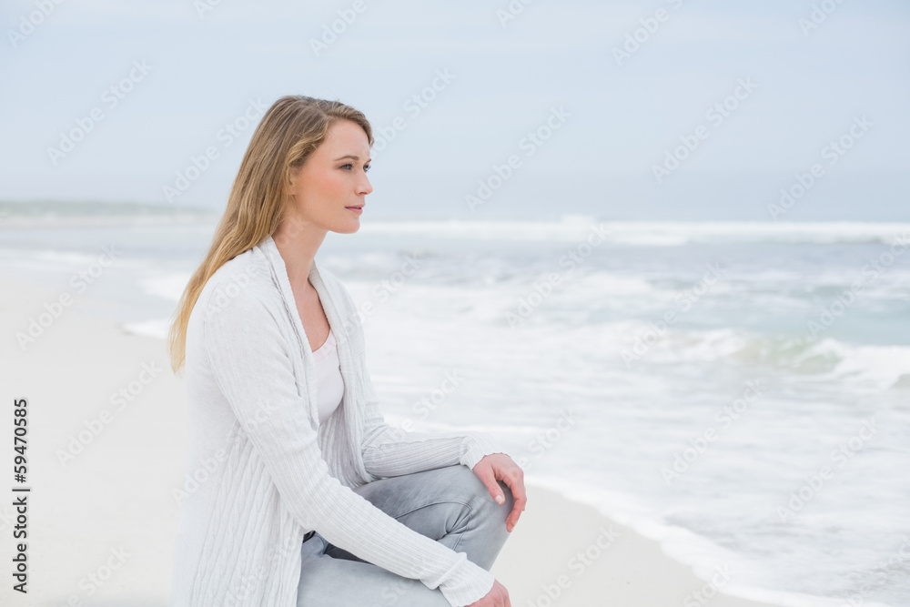 Casual young woman relaxing at beach