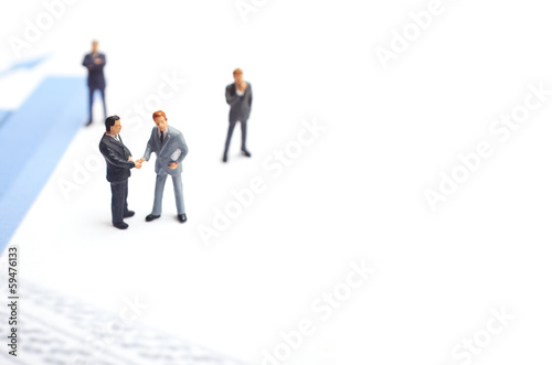 Business meeting. Figures of businessman. © ZoomTeam