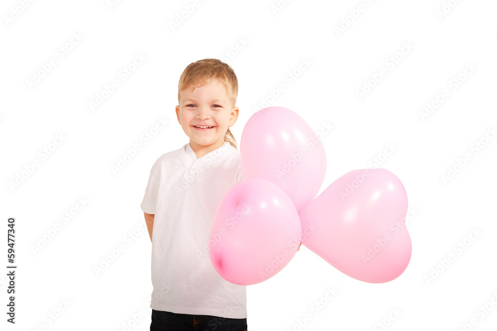 Boy playing with heart balloons, giving them Boy playing with heart balloons, giving them