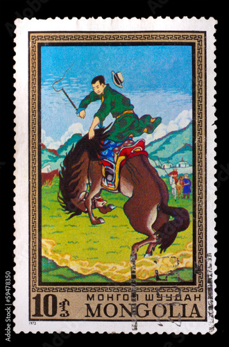 CIRCA 1972: A stamp printed by MONGOLIA , horseback w