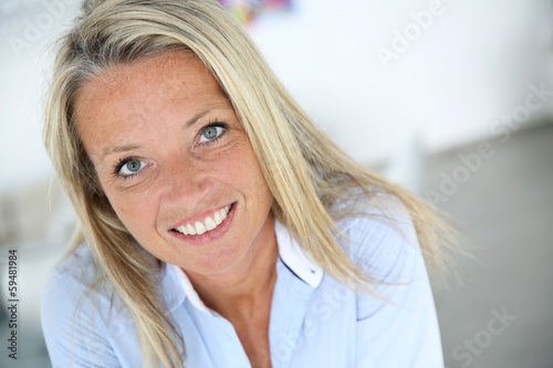 Portrait of smiling 40 year old woman photo