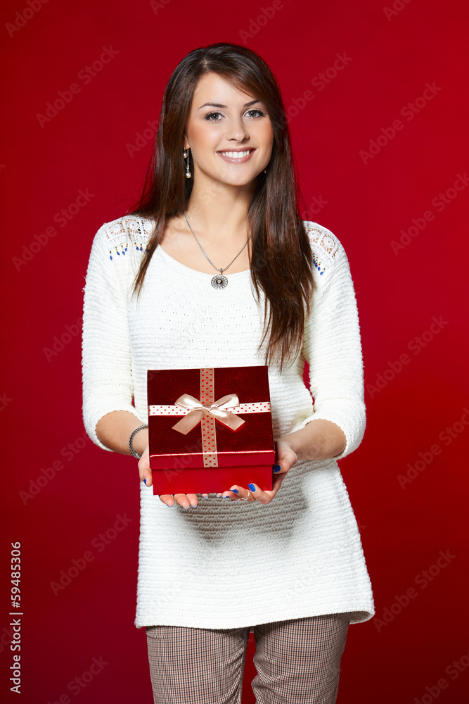 Fototapeta premium Happy young girl with gift box