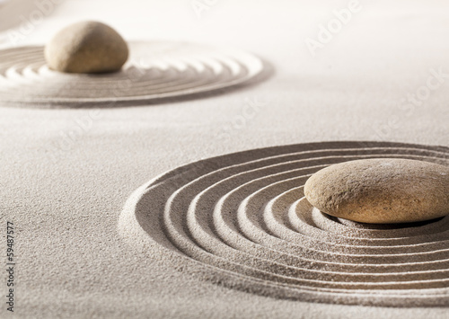 zen balance with stones and sand