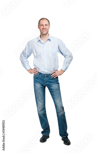 Smiling man in blue shirt and jeanse isolated on white backgroun