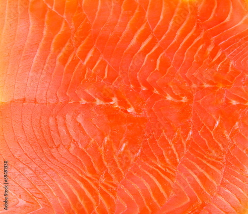 Smoked trout fillet slices as background