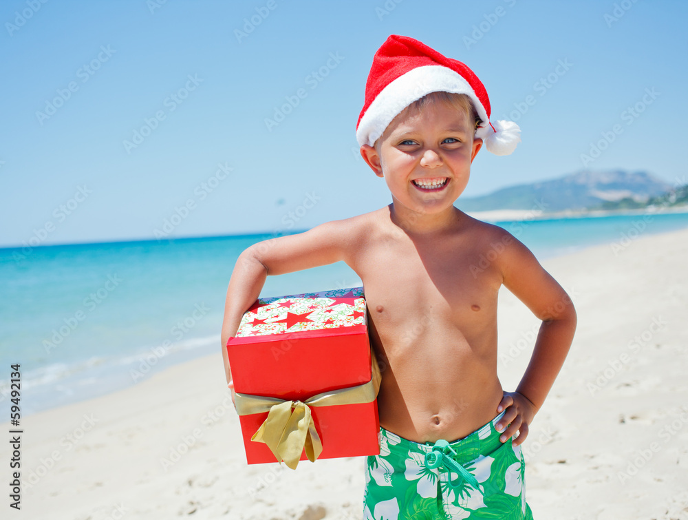 Obraz premium Little boy in santa hat