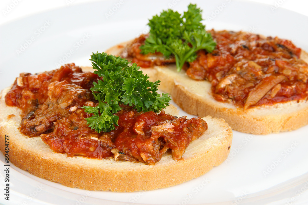 Tasty sandwiches with sardines and tomato sauce, close-up Tasty sandwiches with sardines and tomato sauce, close-up