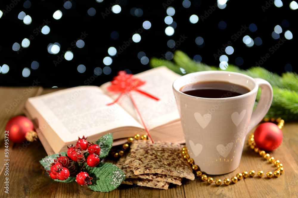 Composition of book with cup of coffee and Christmas Composition of book with cup of coffee and Christmas