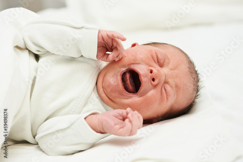 screaming newborn baby photo